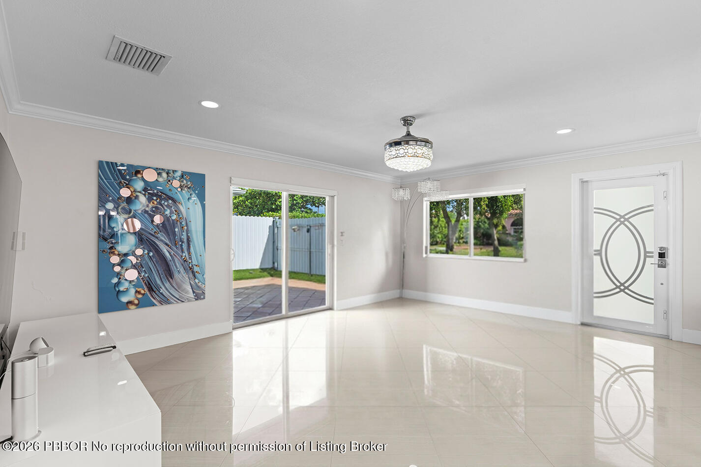 747 Avon Road West Palm Beach, FL 33401 - Photo 7 of 29 a view of an entryway with wooden floor