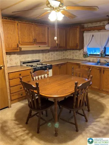 a view of a dining room with furniture