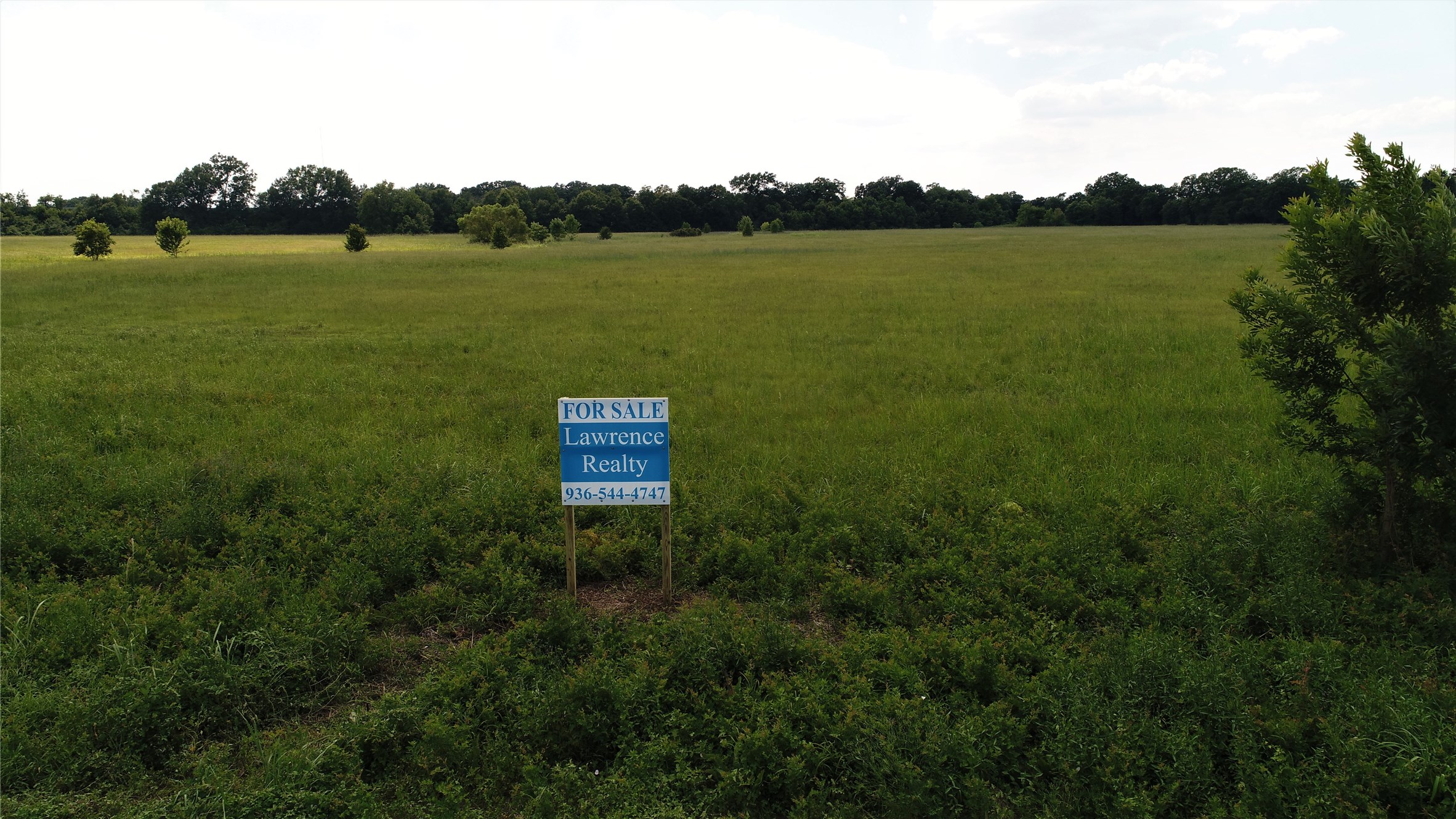 304 East Loop 304 Crockett, TX 75835 - Photo 10 of 11 a view of a lake and green valley