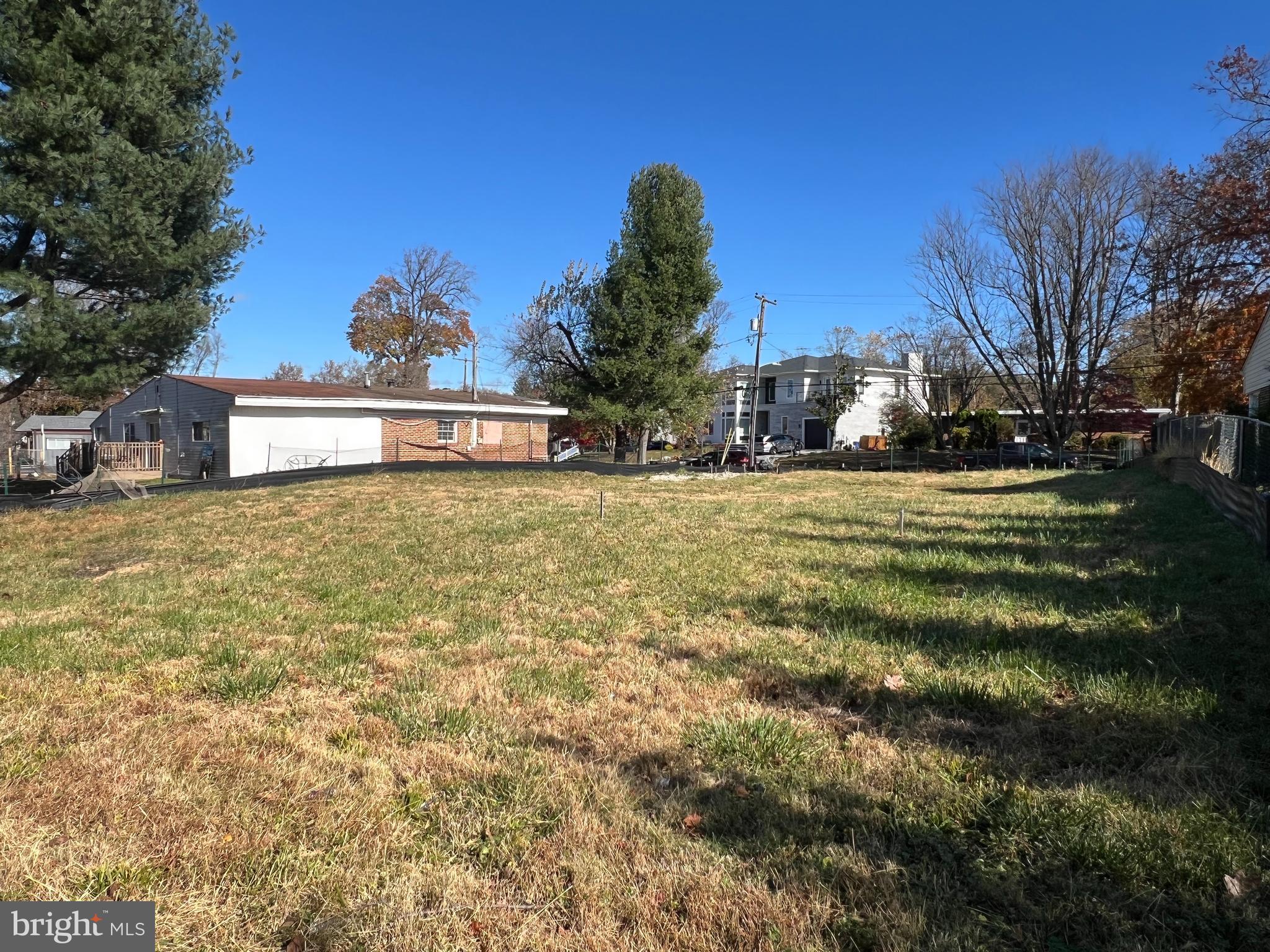 7618 Carla Road Pikesville, MD 21208 - Photo 3 of 4 a view of a house with a yard