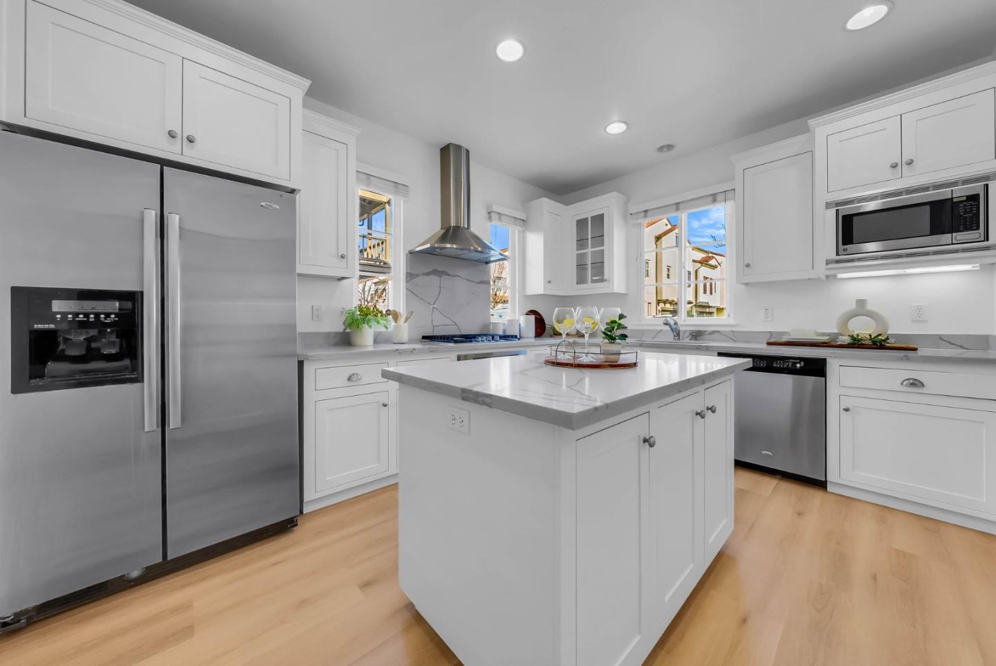 503 Palo Verde Common Fremont, CA 94539 - Photo 13 of 38 a kitchen with stainless steel appliances a refrigerator sink and microwave