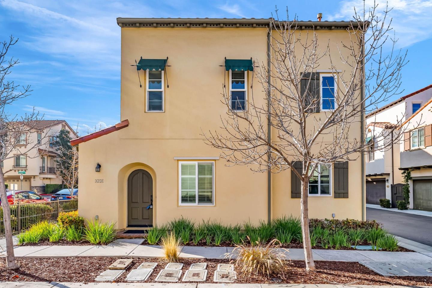 503 Palo Verde Common Fremont, CA 94539 - Photo 2 of 38 a front view of a house with garden