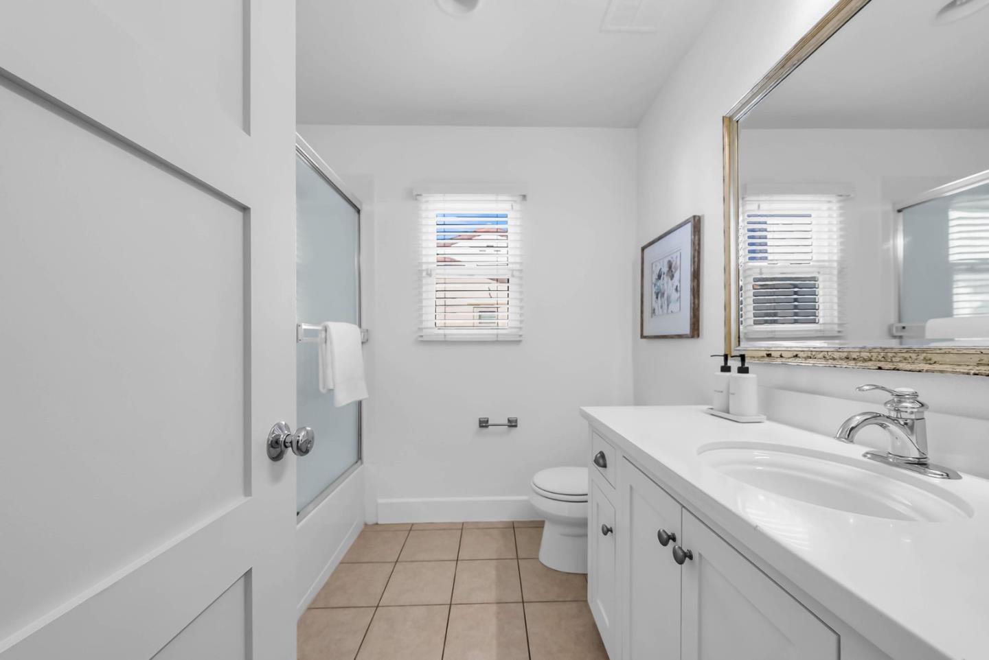 503 Palo Verde Common Fremont, CA 94539 - Photo 27 of 38 a bathroom with a granite countertop sink a toilet and shower