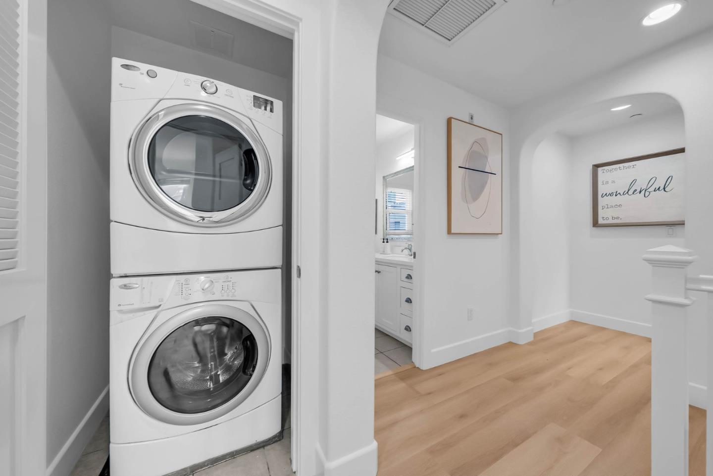 503 Palo Verde Common Fremont, CA 94539 - Photo 32 of 38 a view of a hallway with washer and dryer