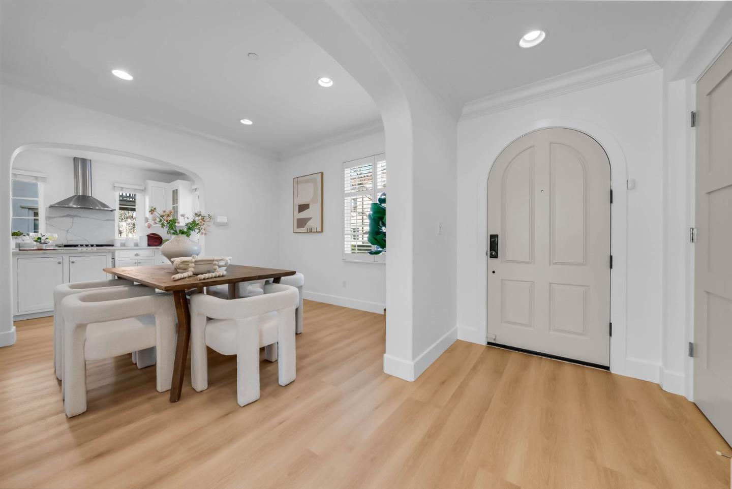 503 Palo Verde Common Fremont, CA 94539 - Photo 10 of 38 a kitchen with stainless steel appliances a dining table chairs and wooden floor