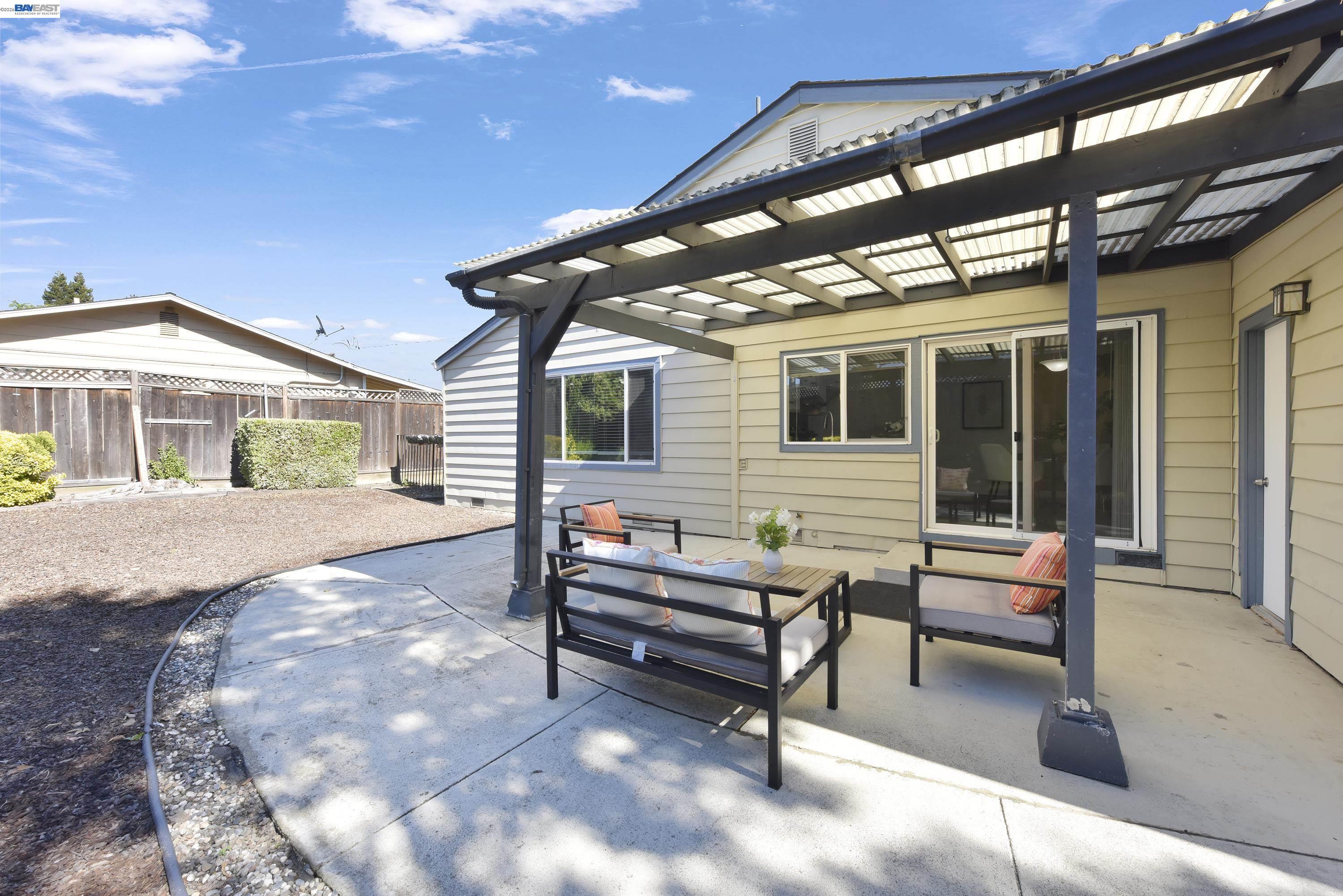 20 Yale Court San Ramon, CA 94583 - Photo 25 of 27 a backyard view with a seating space