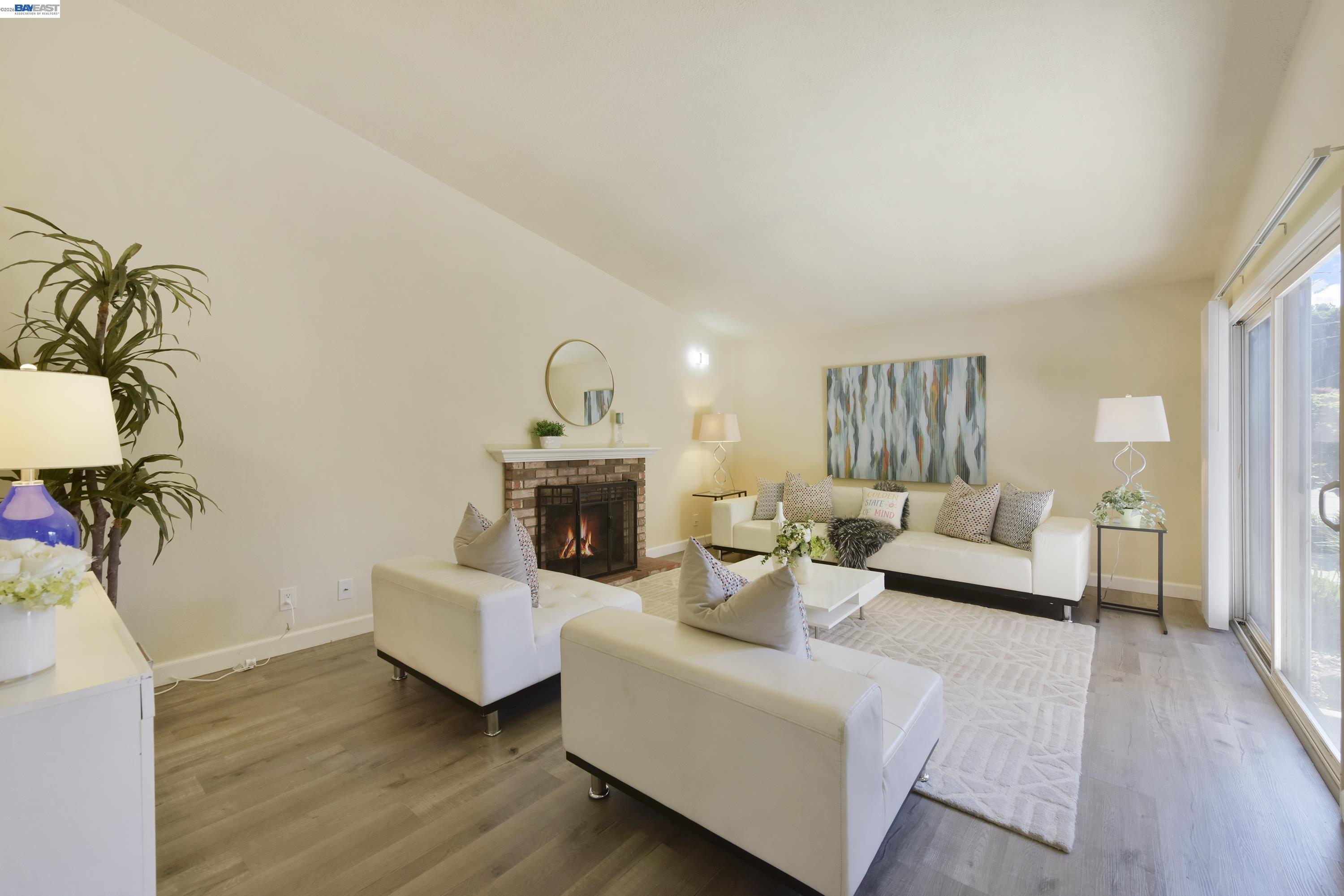 20 Yale Court San Ramon, CA 94583 - Photo 3 of 27 a living room with furniture and a fireplace