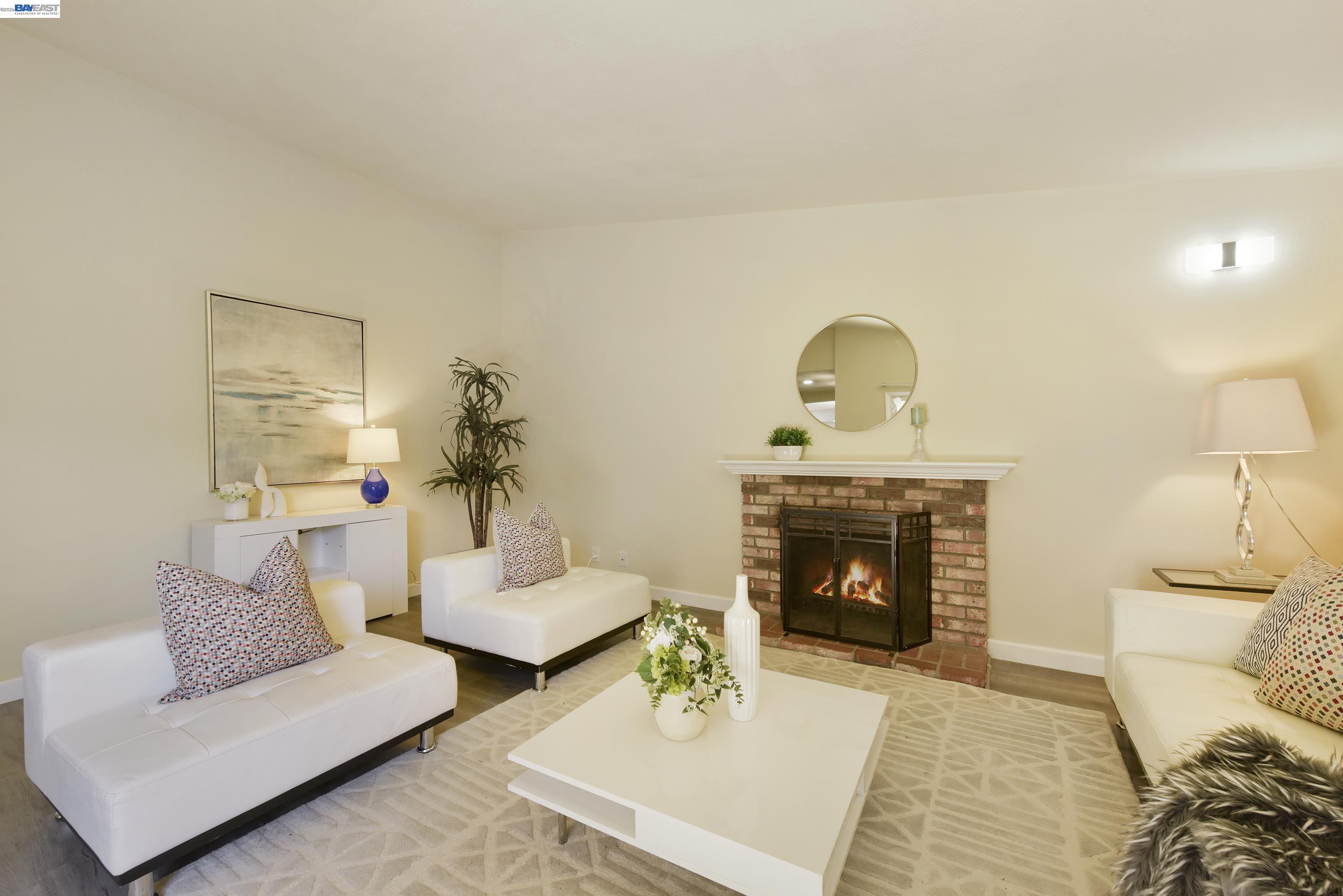 20 Yale Court San Ramon, CA 94583 - Photo 6 of 27 a living room with furniture and a fireplace