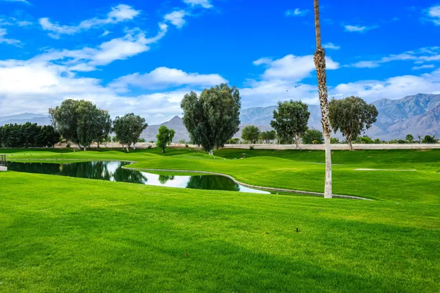 a view of a golf course with a garden