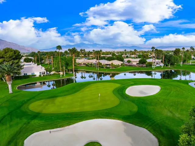 a view of swimming pool with lounge chair