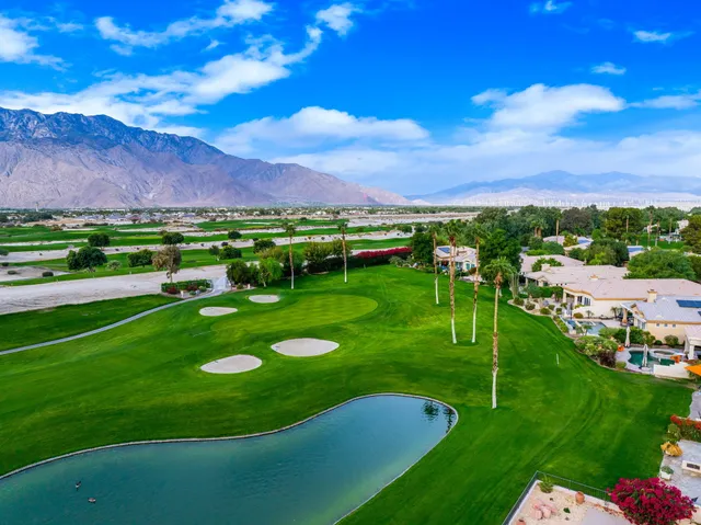 a view of a lake with a big yard