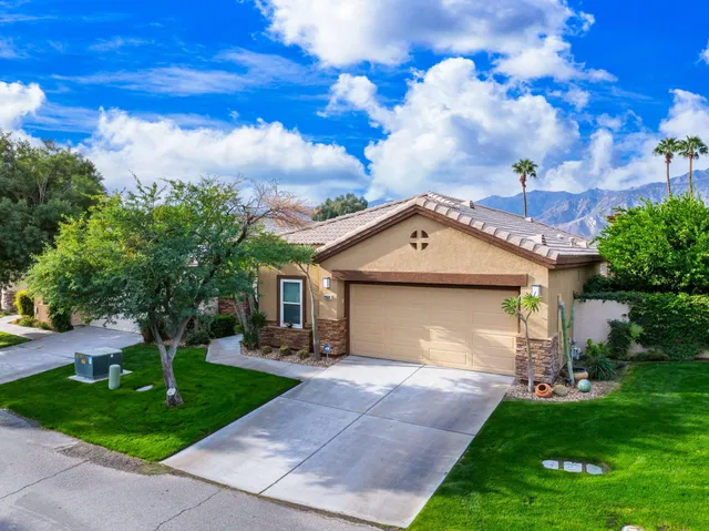 an aerial view of a golf course with a garden
