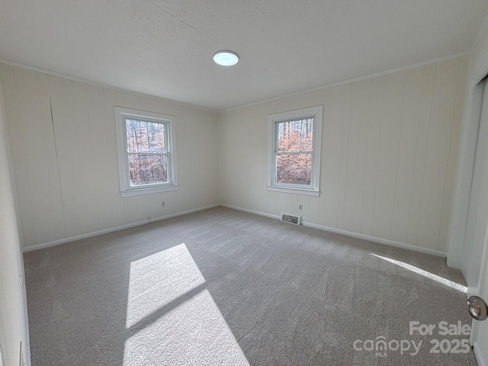 1117 Red Street Kannapolis, NC 28081 - Photo 18 of 48 an empty room with windows
