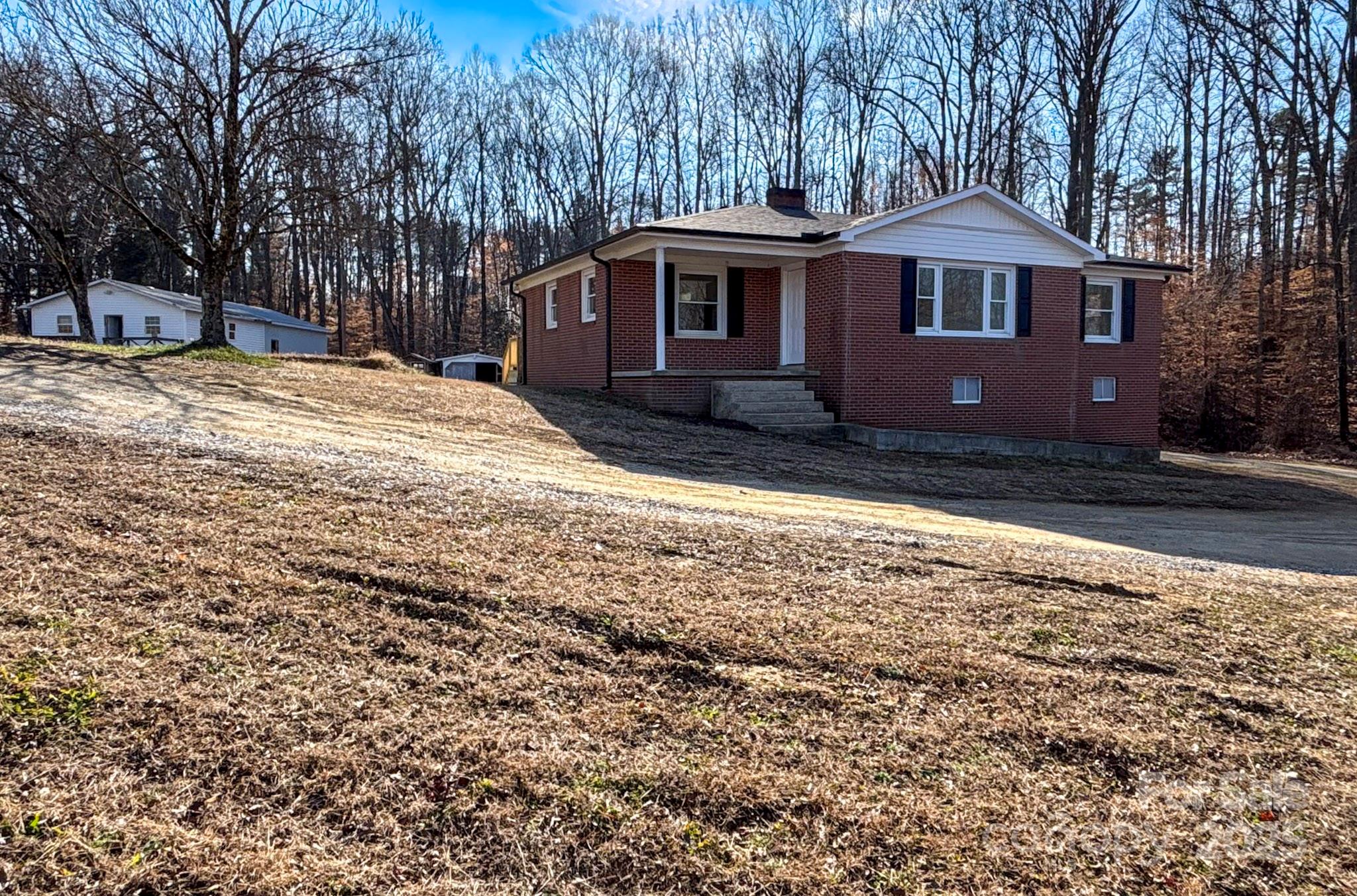 1117 Red Street Kannapolis, NC 28081 - Photo 2 of 48 a front view of a house with a yard