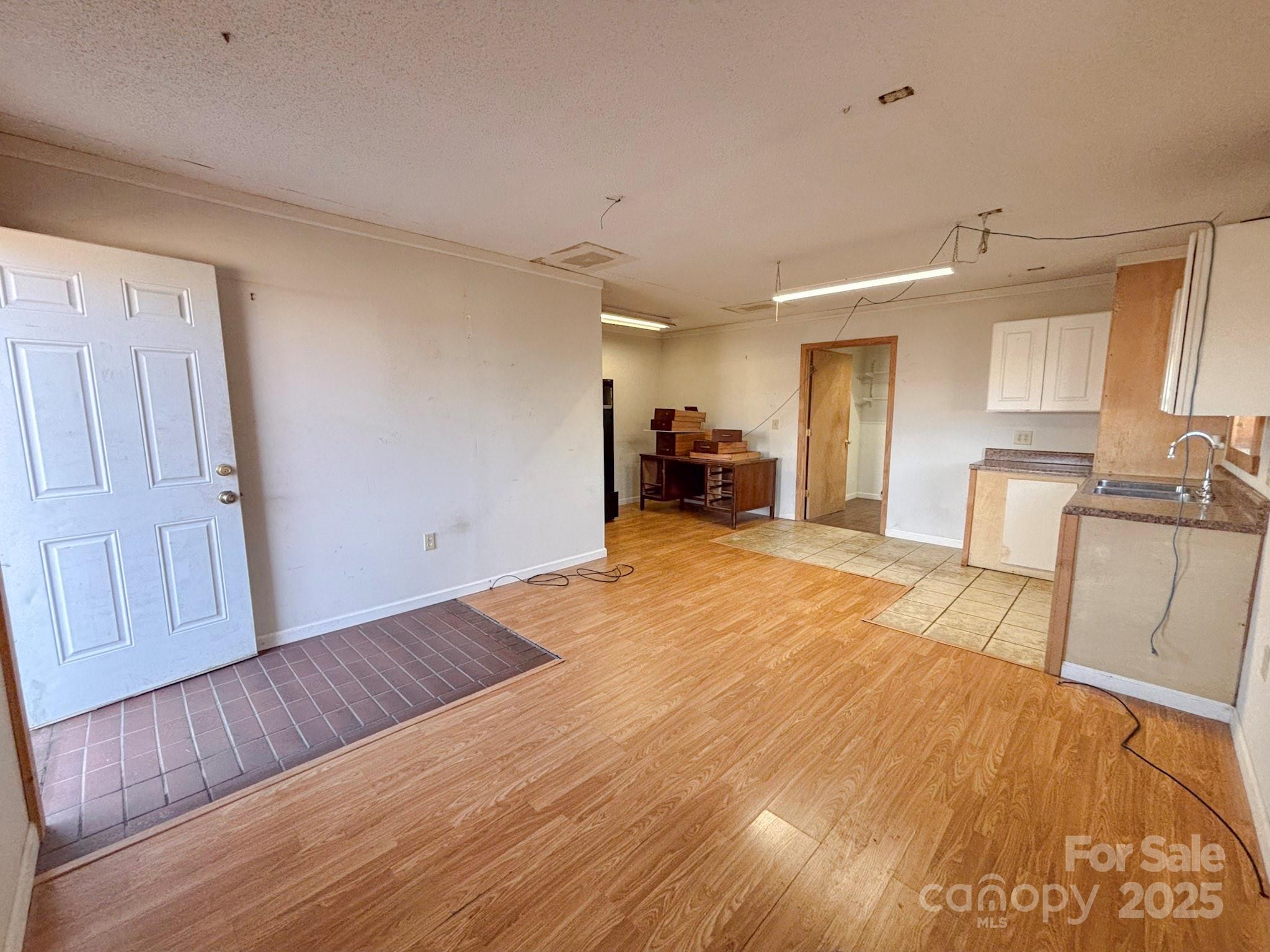 1117 Red Street Kannapolis, NC 28081 - Photo 36 of 48 a view of a kitchen with furniture and wooden floor