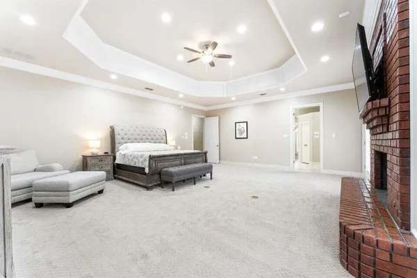 a bedroom with furniture and a couch