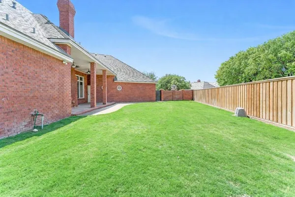 a view of a garden with an outdoor space