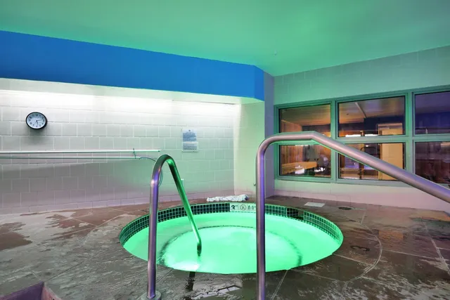 a room with table and chairs