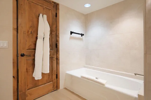 a bathroom with a sink vanity and a mirror