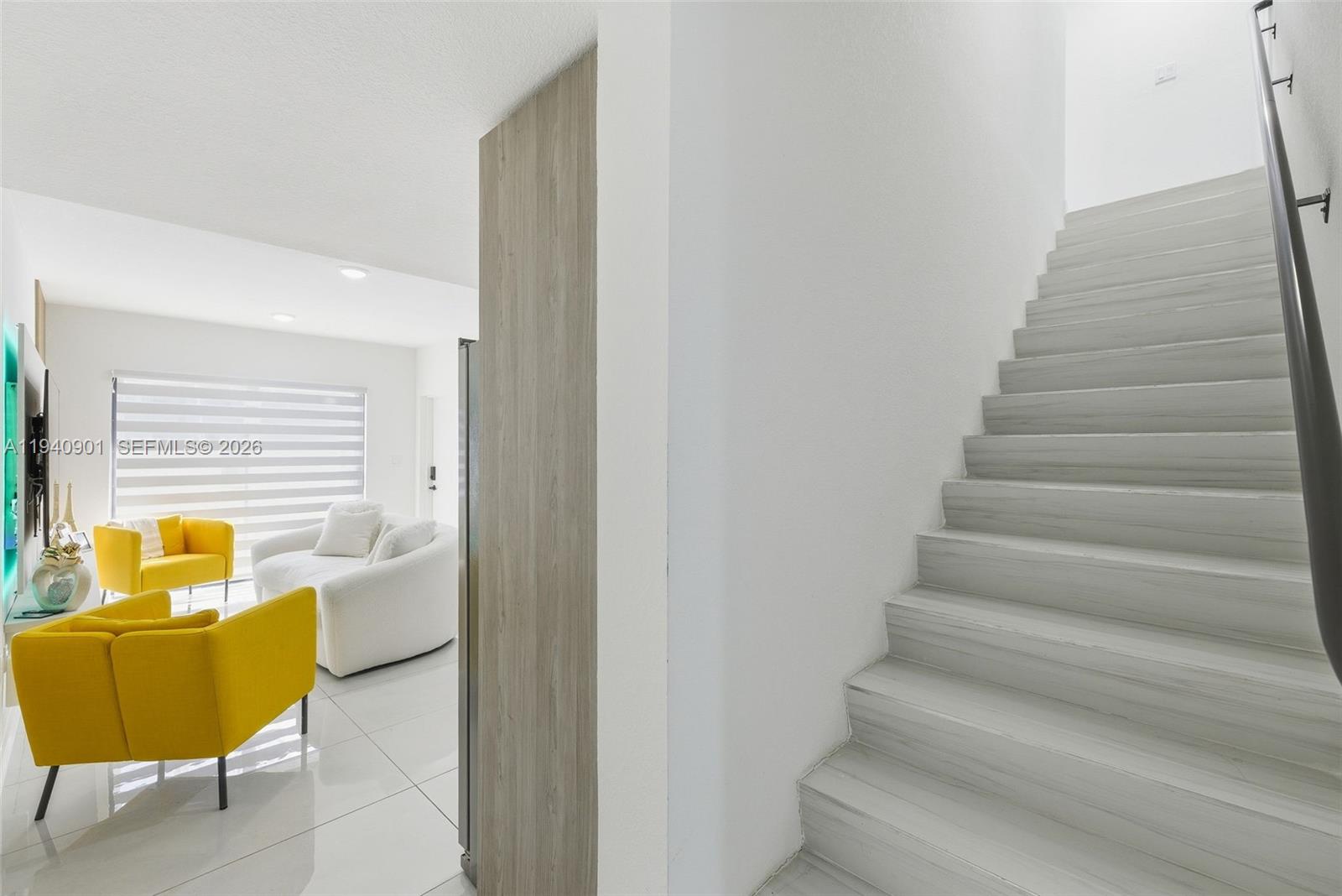 26122 Southwest 145th Court Homestead, FL 33033 - Photo 15 of 54 a view of entryway and hall with wooden floor