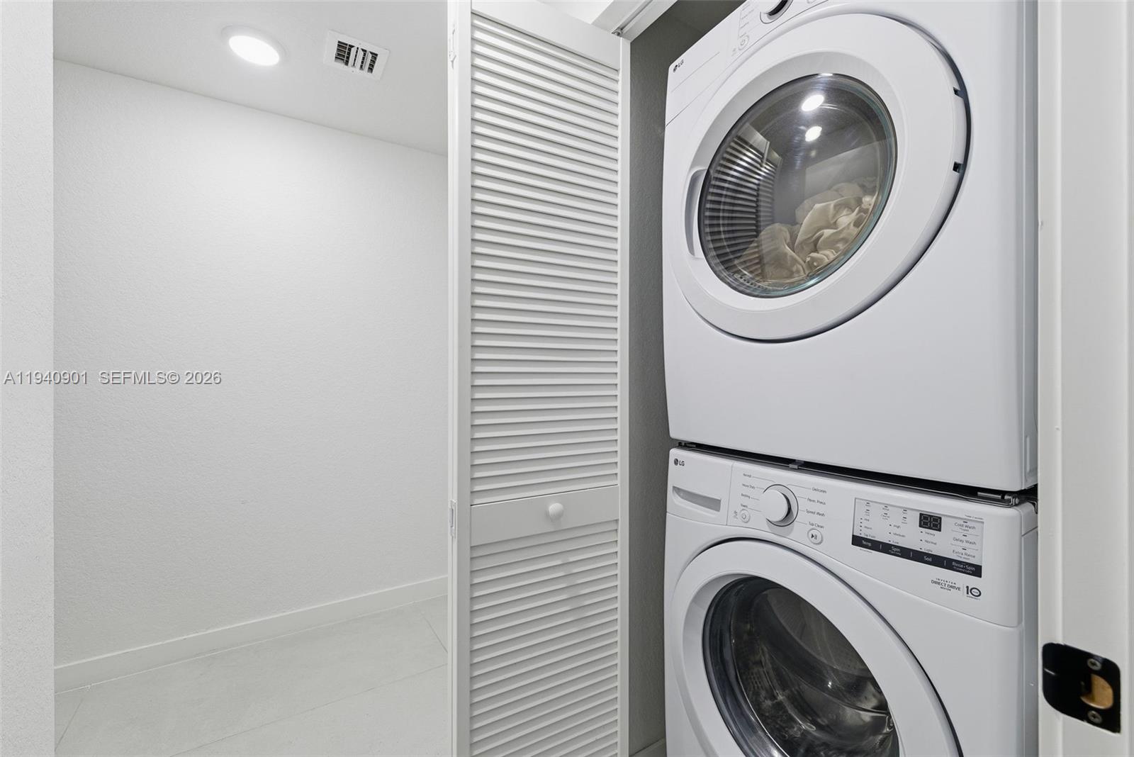 26122 Southwest 145th Court Homestead, FL 33033 - Photo 19 of 54 a close up view of a washer and dryer in a room