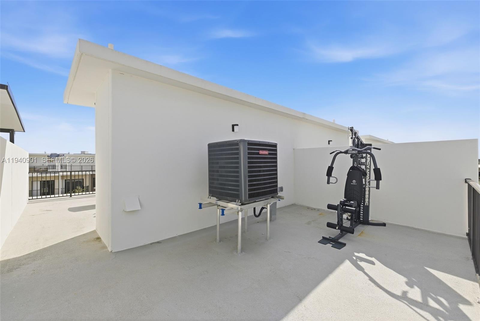 26122 Southwest 145th Court Homestead, FL 33033 - Photo 28 of 54 a view of a room with gym equipment