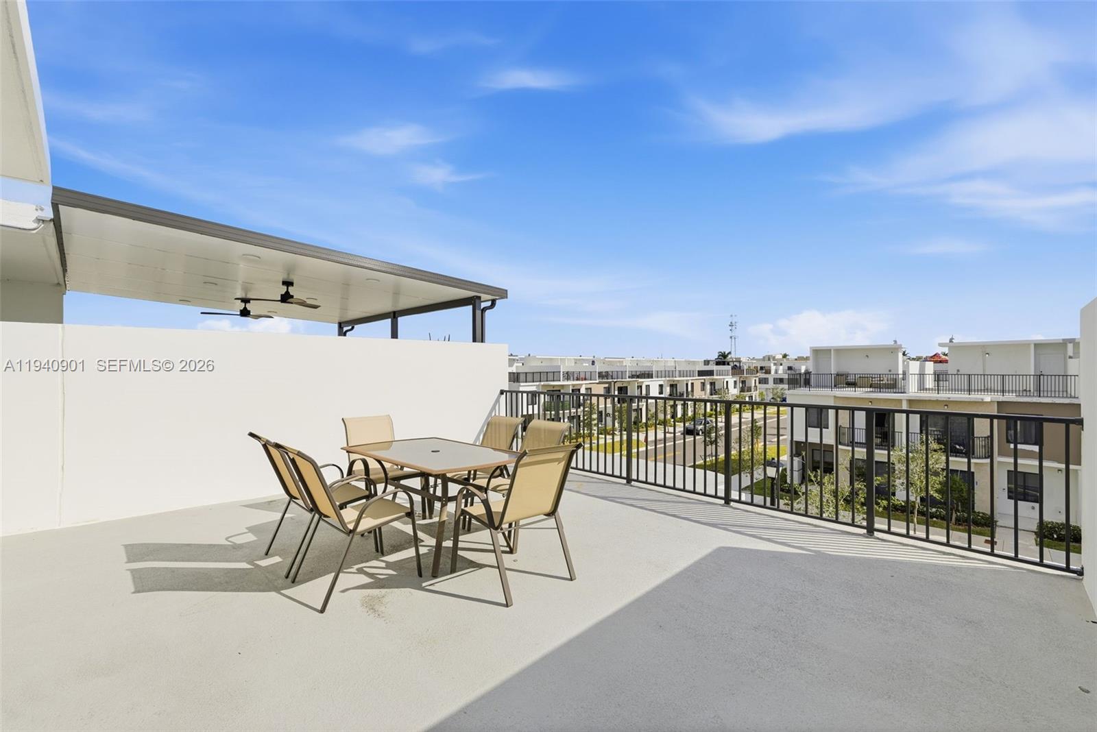 26122 Southwest 145th Court Homestead, FL 33033 - Photo 29 of 54 a view of a terrace with furniture and city view