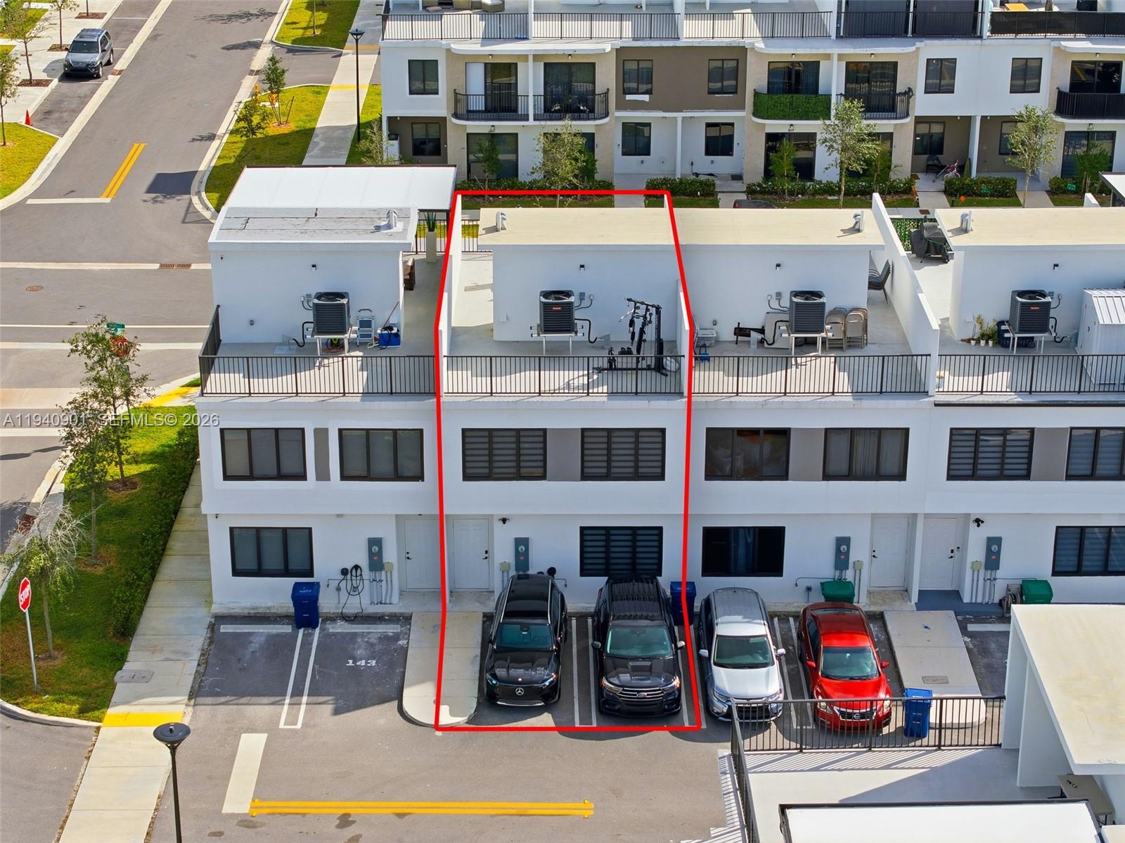 26122 Southwest 145th Court Homestead, FL 33033 - Photo 49 of 54 a car parked in front of a building