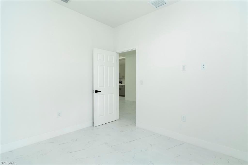 3810 29th Street Southwest Lehigh Acres, FL 33976 - Photo 33 of 48 a view of an empty room