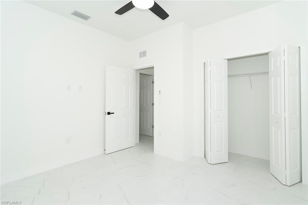 3810 29th Street Southwest Lehigh Acres, FL 33976 - Photo 40 of 48 a view of an empty room