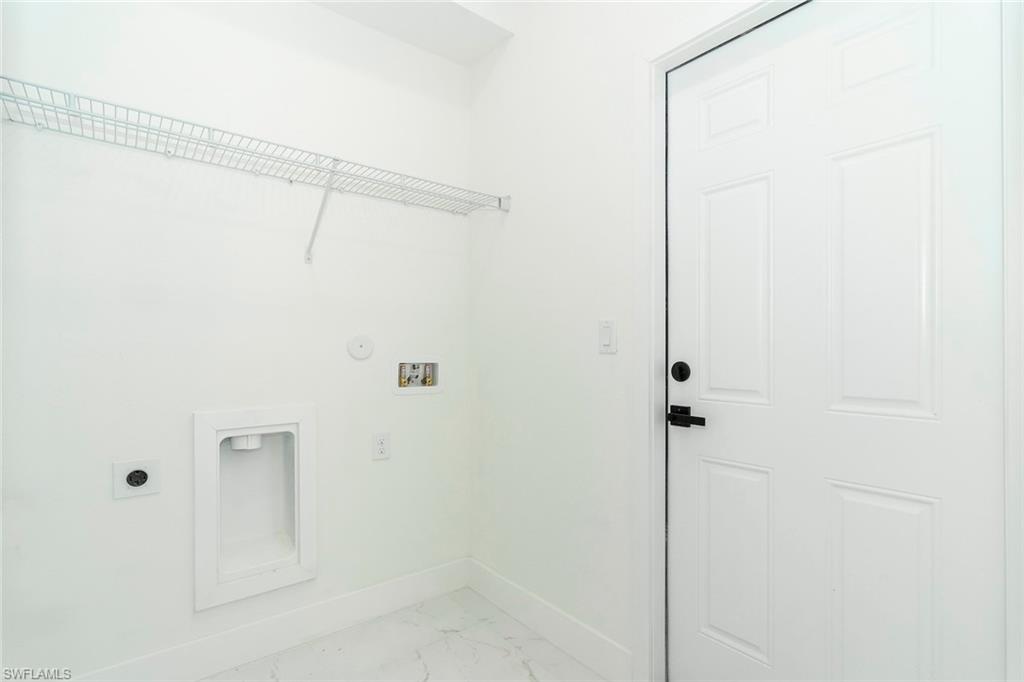 3810 29th Street Southwest Lehigh Acres, FL 33976 - Photo 43 of 48 a bathroom with a shower