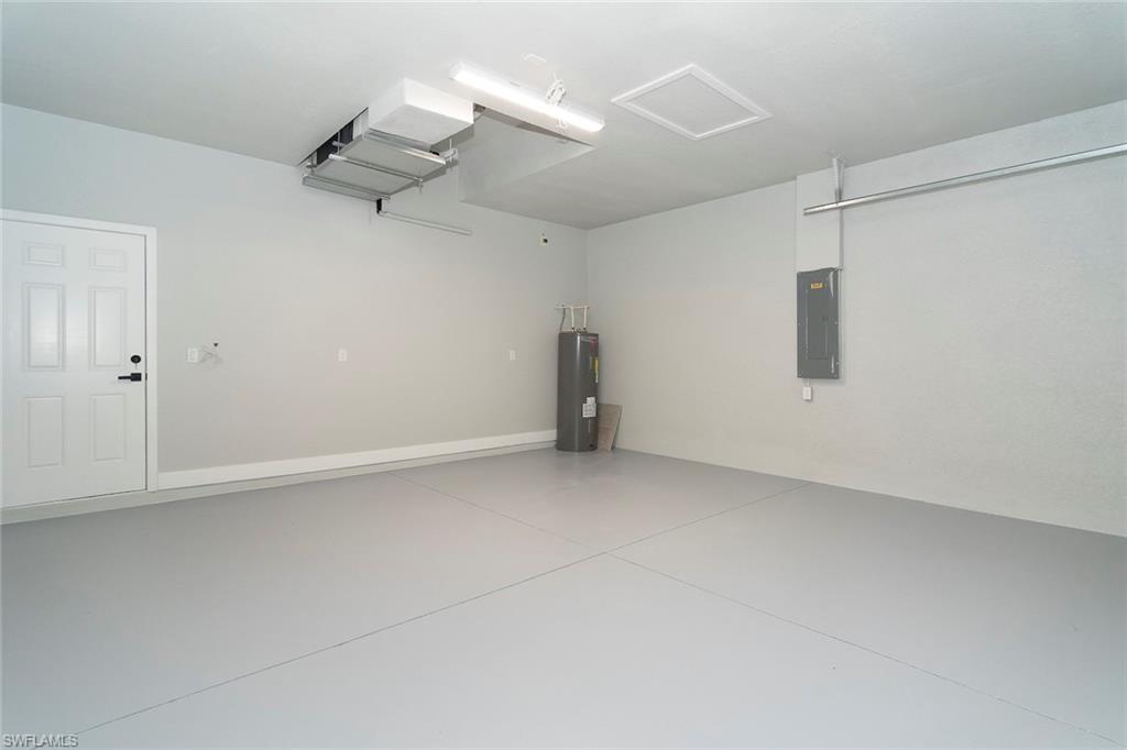 3810 29th Street Southwest Lehigh Acres, FL 33976 - Photo 44 of 48 an empty room with a ceiling fan and window
