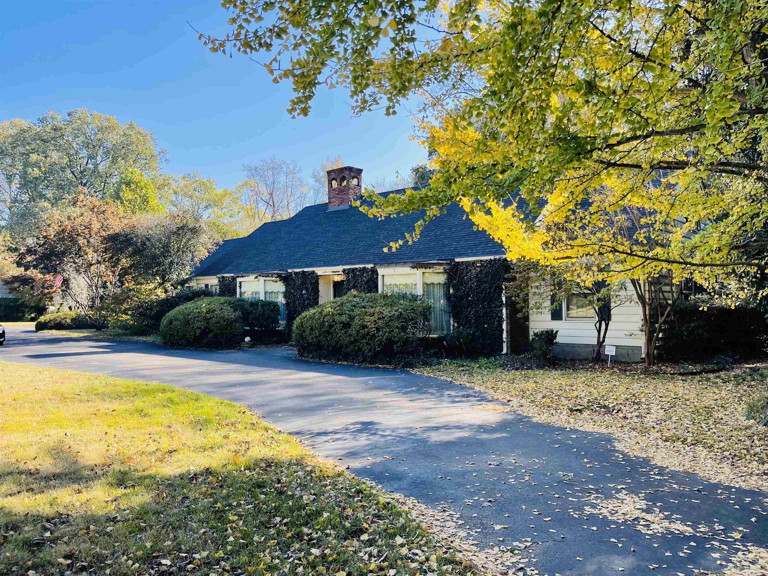 a front view of a house with swimming pool