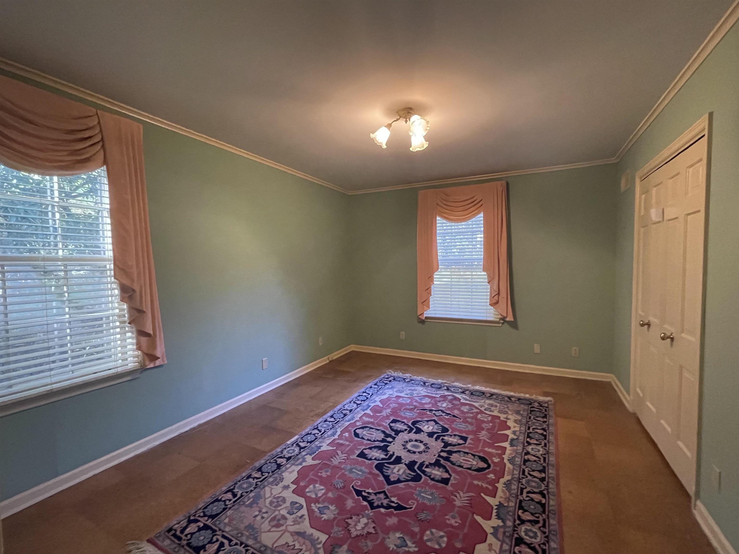 4477 Tall Trees Drive Memphis, TN 38117 - Photo 12 of 25 a view of an empty room with a window