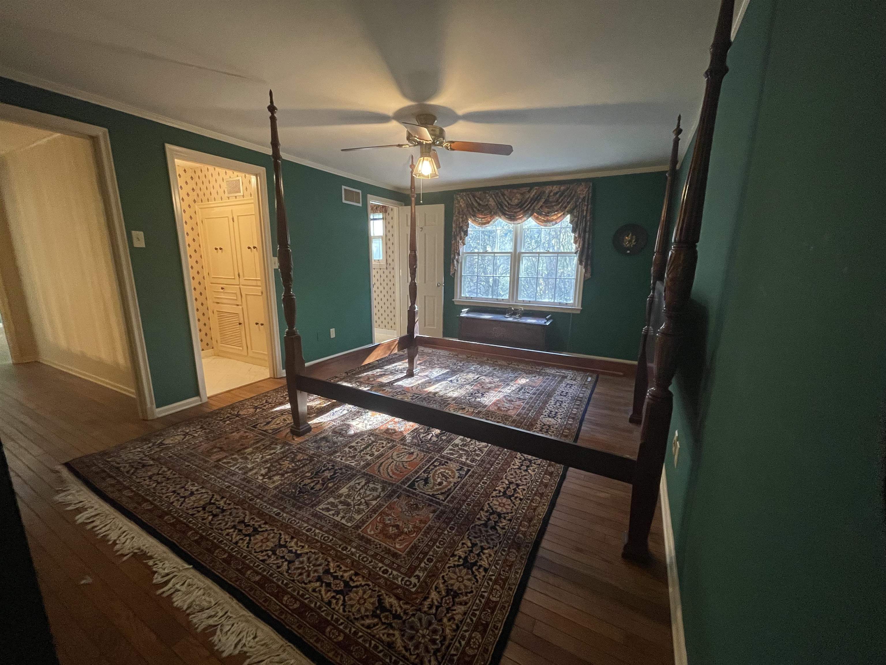 4477 Tall Trees Drive Memphis, TN 38117 - Photo 17 of 25 a bedroom with a bed and a window