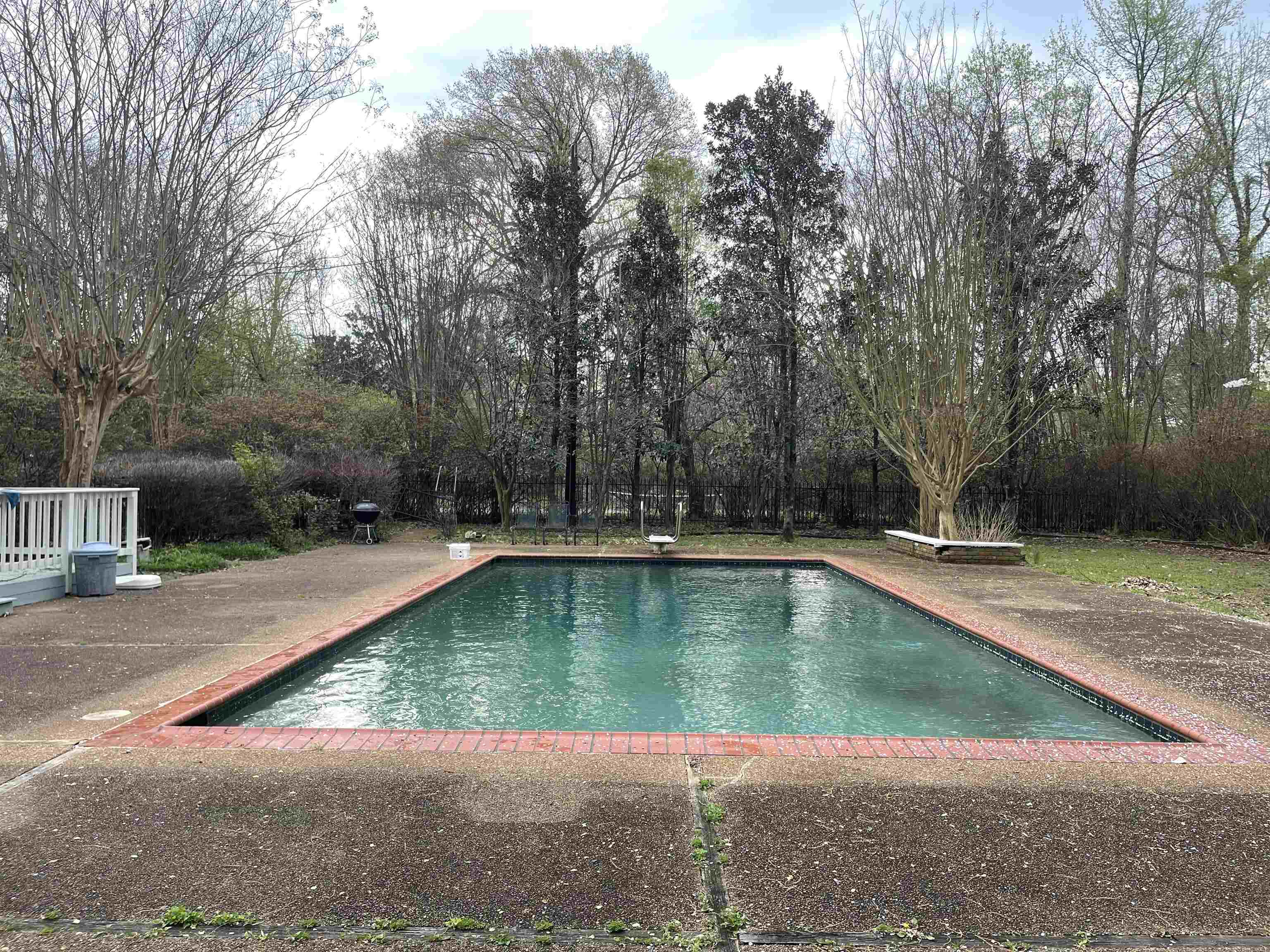 4477 Tall Trees Drive Memphis, TN 38117 - Photo 24 of 25 a view of a swimming pool with a sitting area