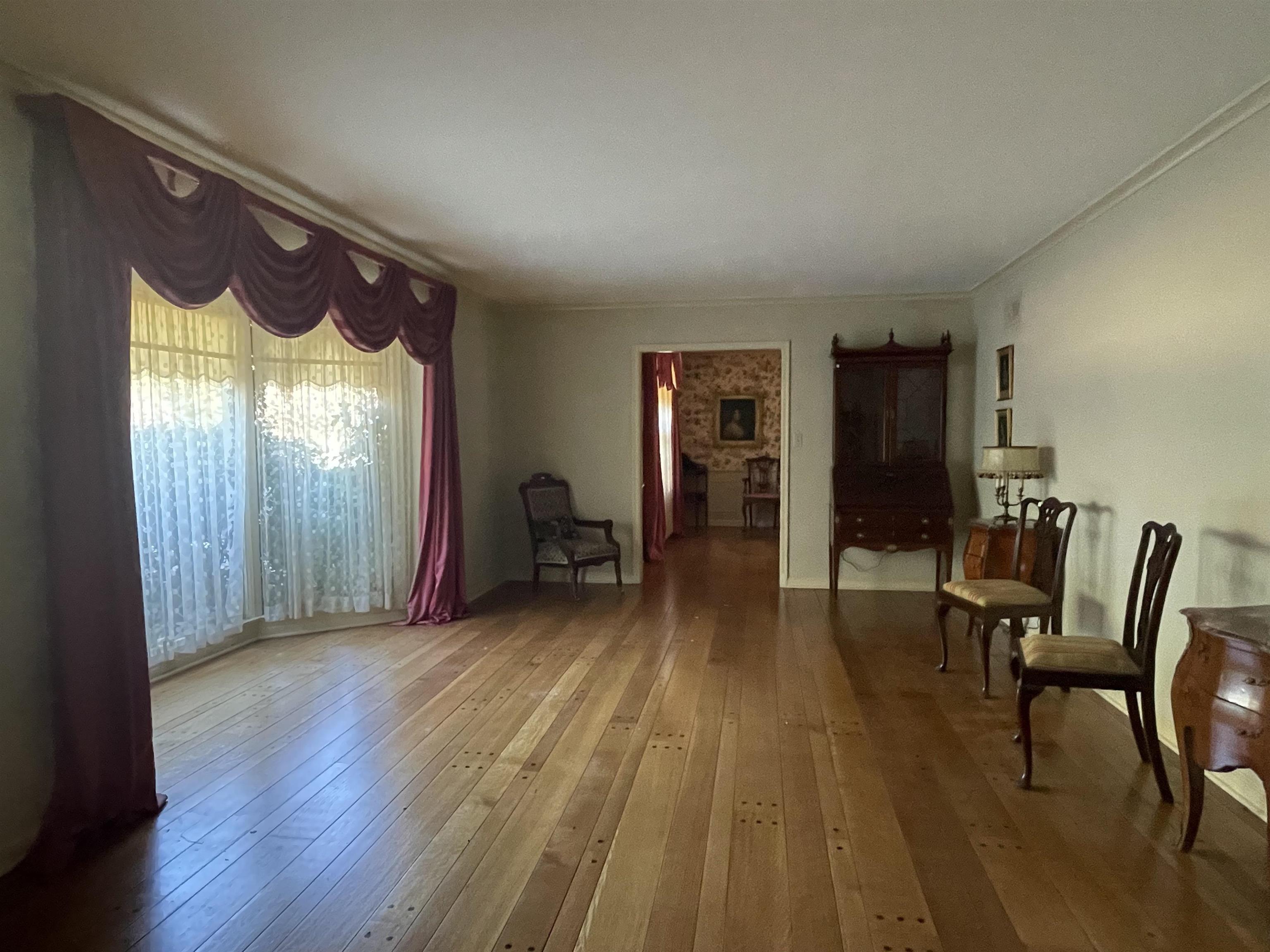 4477 Tall Trees Drive Memphis, TN 38117 - Photo 5 of 25 a view of a room with furniture window and wooden floor