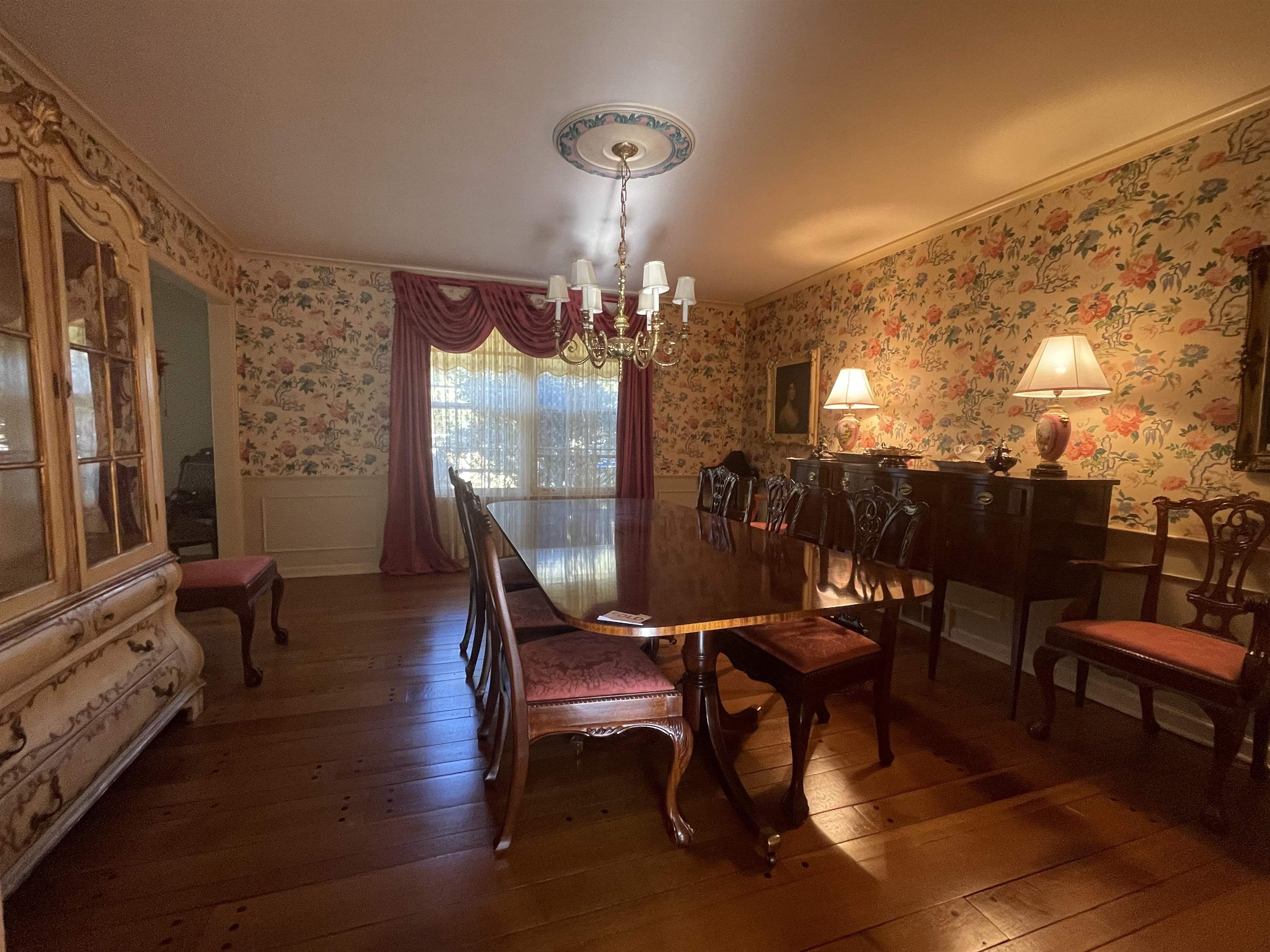 4477 Tall Trees Drive Memphis, TN 38117 - Photo 7 of 25 a dining room with furniture and wooden floor