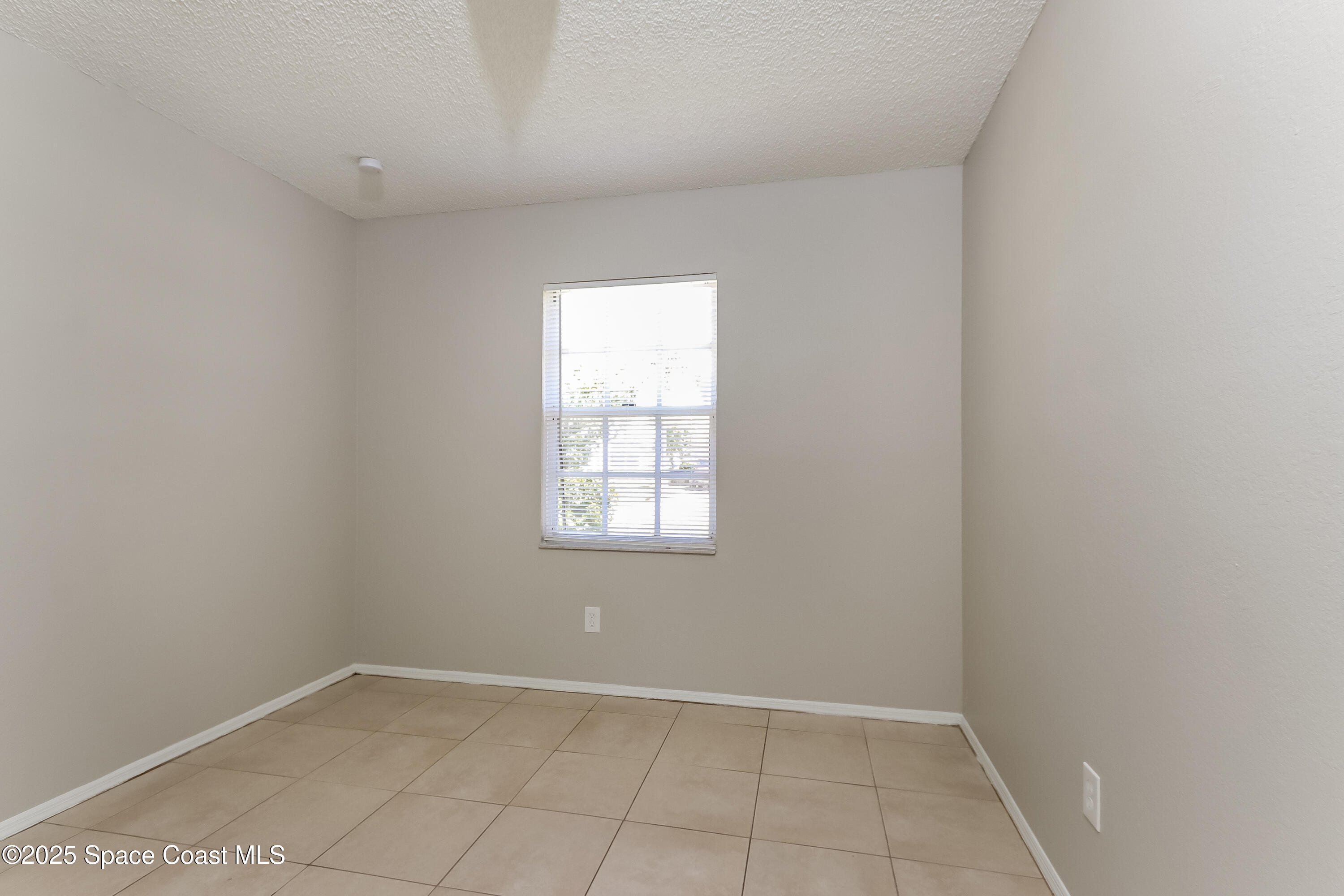2250 Southeast Baron Street Port St. Lucie, FL 34952 - Photo 11 of 16 011-photo-bedroom-9768208