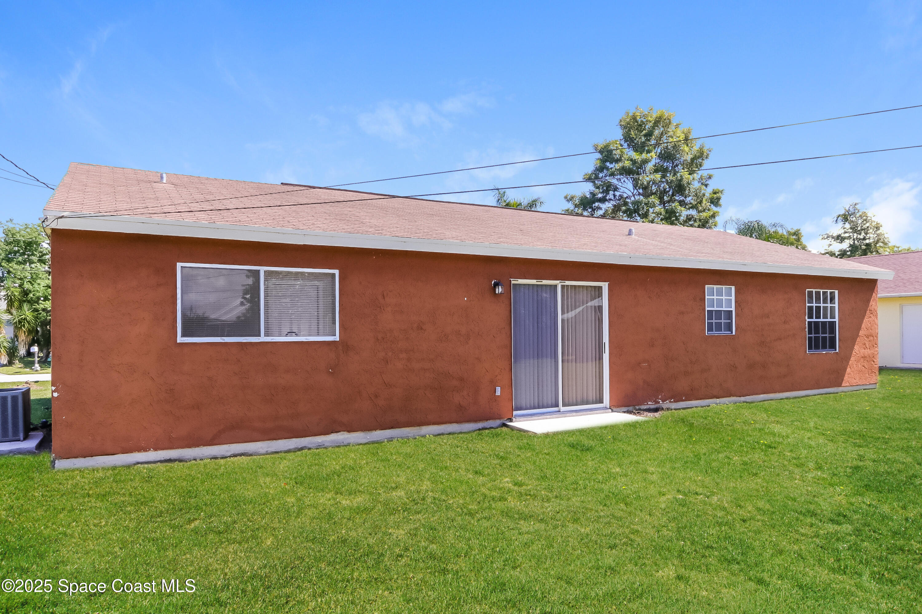 2250 Southeast Baron Street Port St. Lucie, FL 34952 - Photo 14 of 16 014-photo-rear-view-9768199