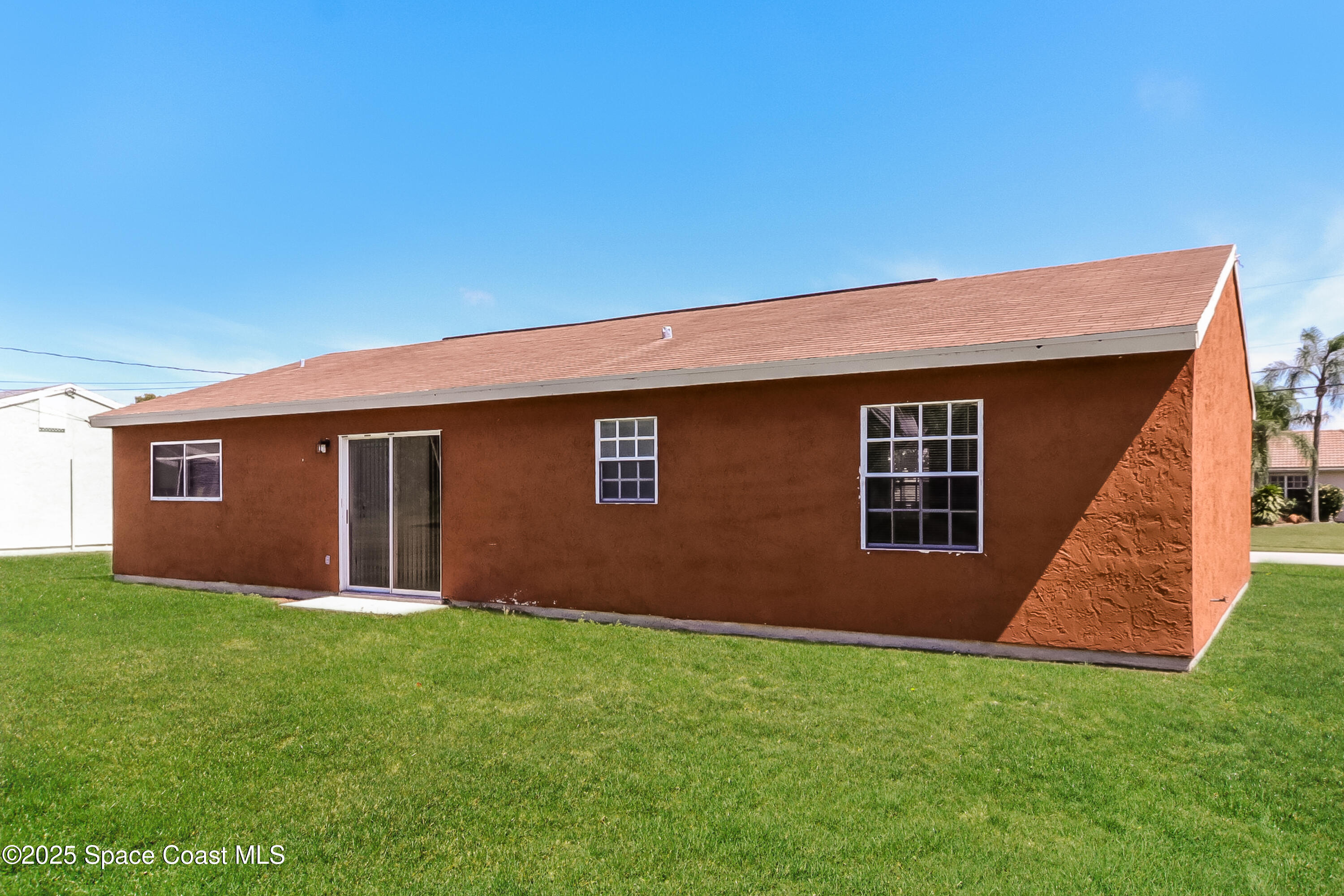 2250 Southeast Baron Street Port St. Lucie, FL 34952 - Photo 15 of 16 015-photo-rear-view-9768201