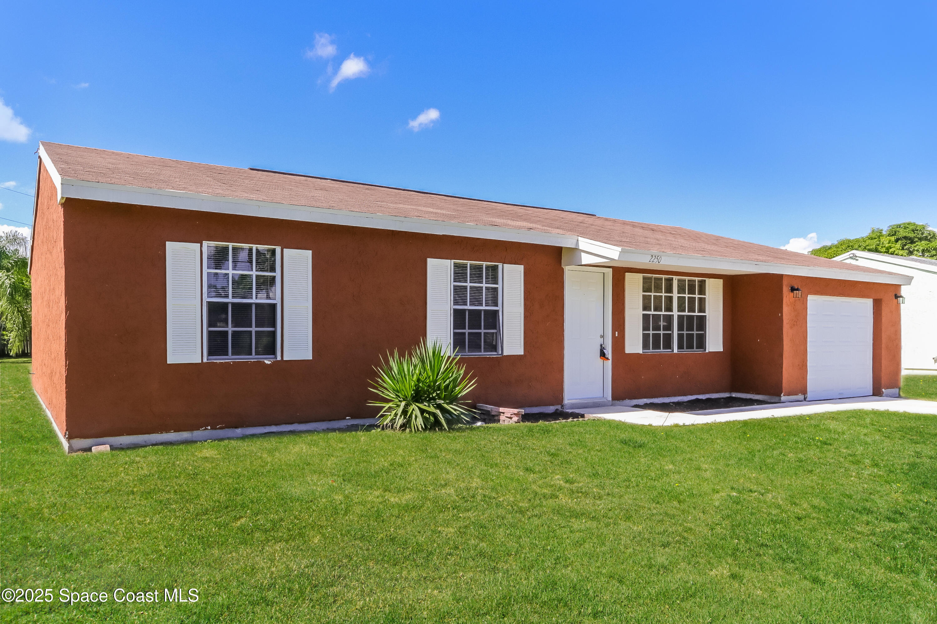 2250 Southeast Baron Street Port St. Lucie, FL 34952 - Photo 2 of 16 002-photo-front-view-9768187