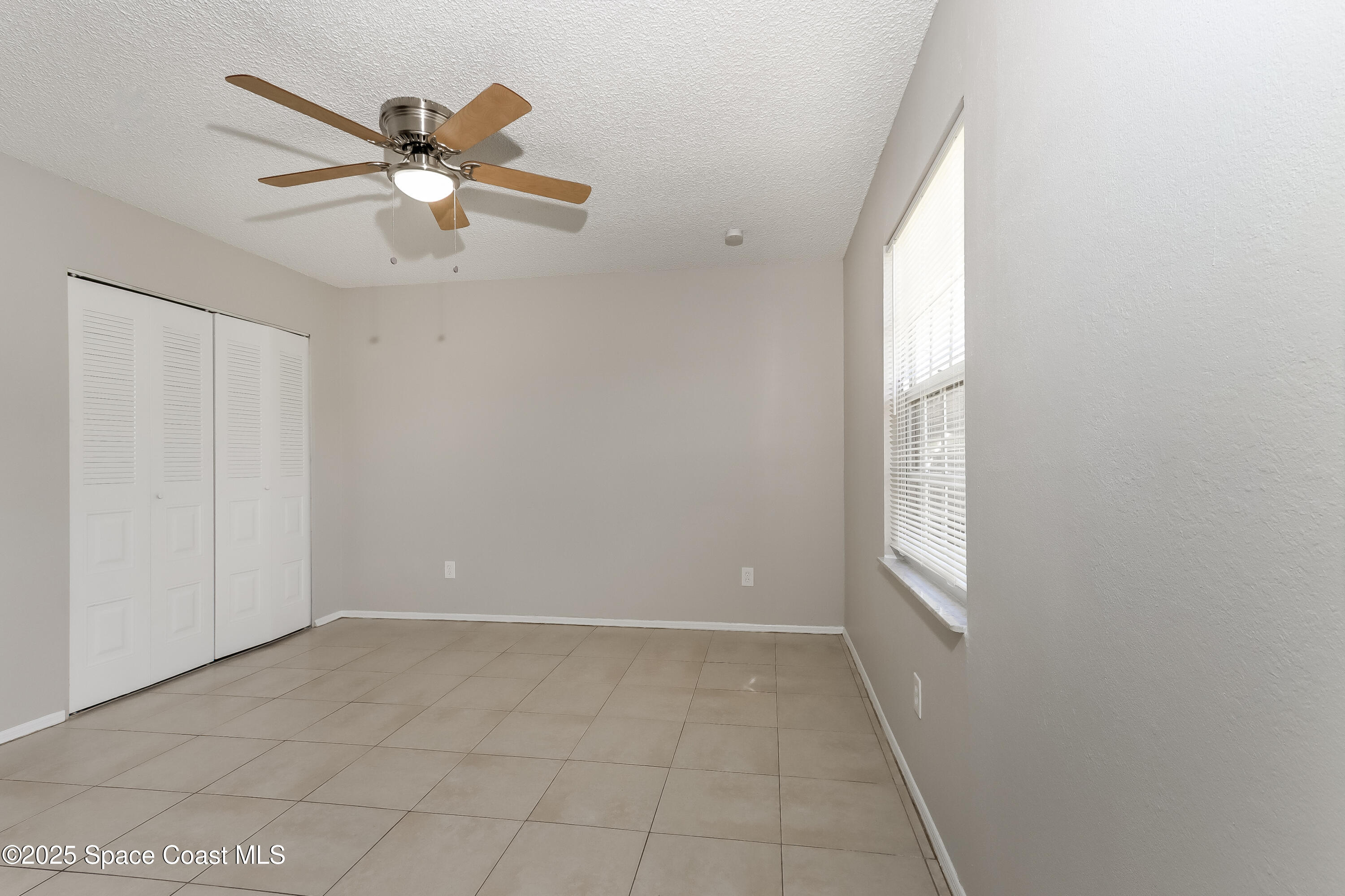 2250 Southeast Baron Street Port St. Lucie, FL 34952 - Photo 7 of 16 007-photo-primary-bedroom-9768193