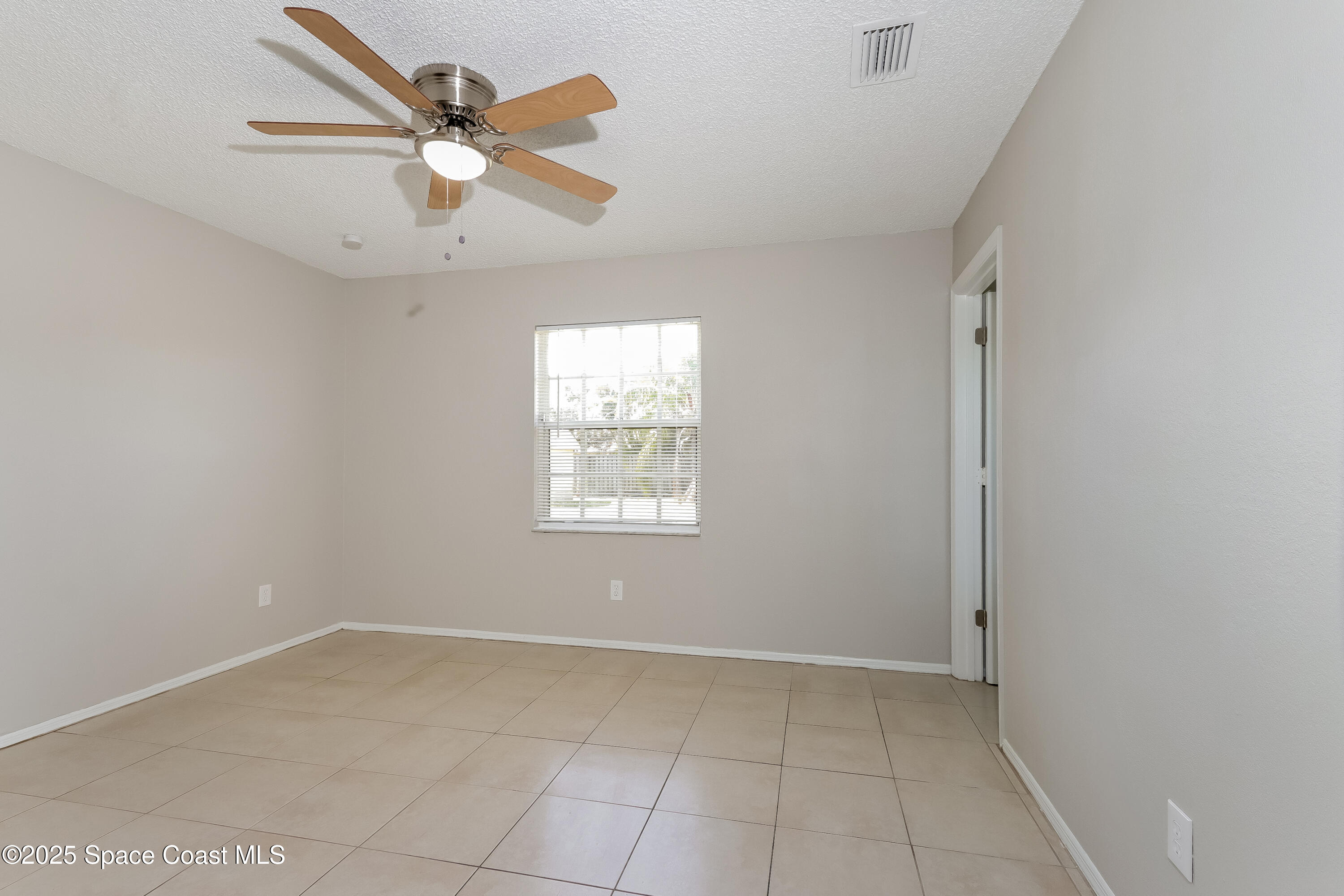2250 Southeast Baron Street Port St. Lucie, FL 34952 - Photo 8 of 16 008-photo-primary-bedroom-9768190