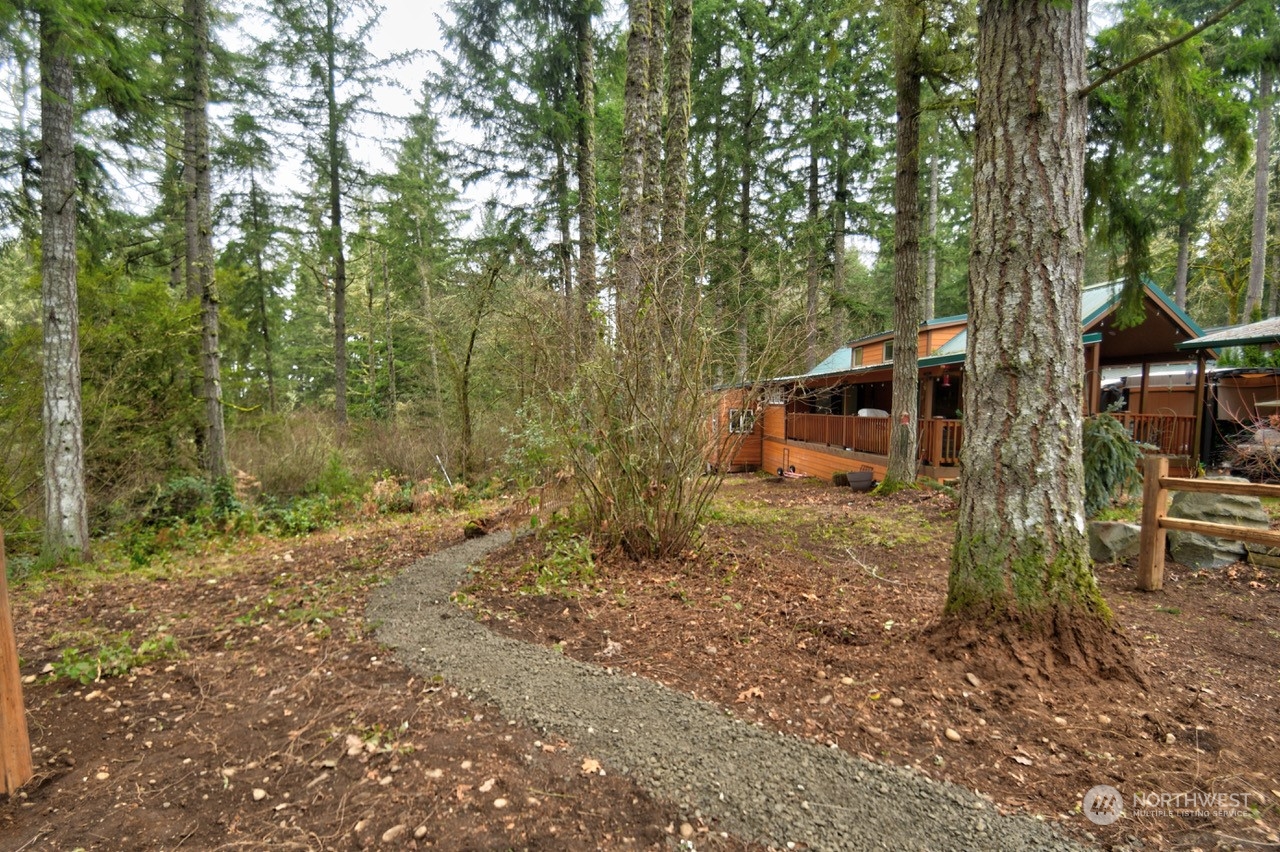 1546 Reservation Road Southeast, Unit 157 Olympia, WA 98513 - Photo 6 of 32 a backyard of a house with lots of green space