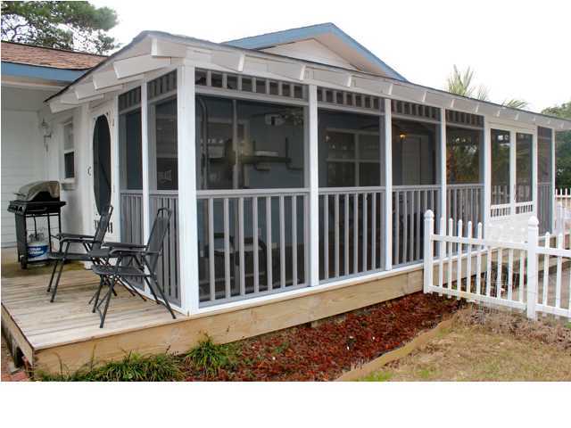 10 Barracuda Street Santa Rosa Beach, FL 32459 - Photo 1 of 14 a black and white photo of a house