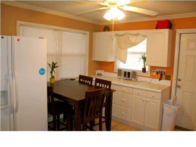 10 Barracuda Street Santa Rosa Beach, FL 32459 - Photo 13 of 14 a bathroom with a sink a chandelier and a mirror