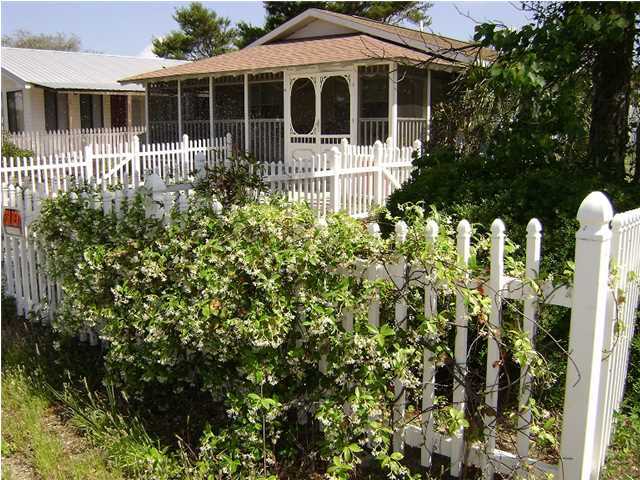10 Barracuda Street Santa Rosa Beach, FL 32459 - Photo 3 of 14 a view of a house with a garden