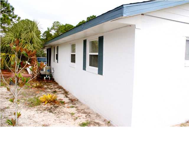 10 Barracuda Street Santa Rosa Beach, FL 32459 - Photo 7 of 14 a view of a backyard