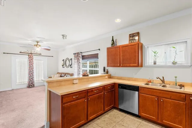 a kitchen with a sink stove and microwave